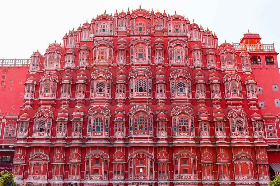 Hawa Mahal — the iconic pink sandstone Palace of Winds in Jaipur, Rajasthan, with its five-story honeycomb facade of 953 small windows